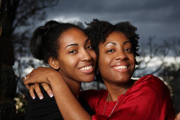 Two women hugging